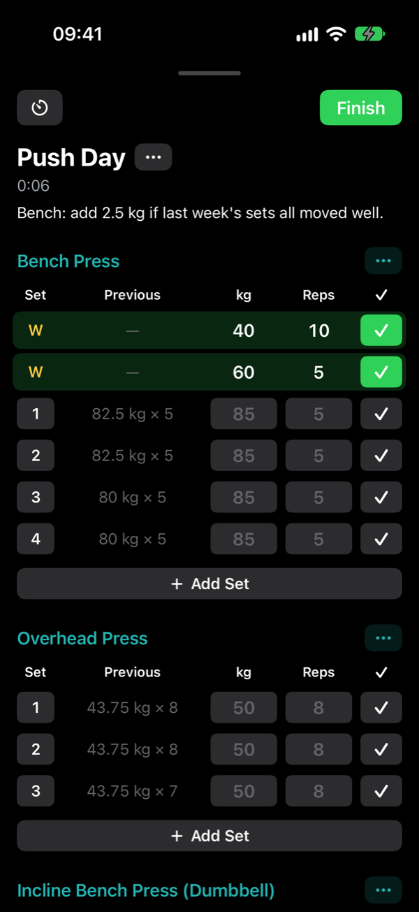 Logging a workout: sets with previous weights, and completed sets in green